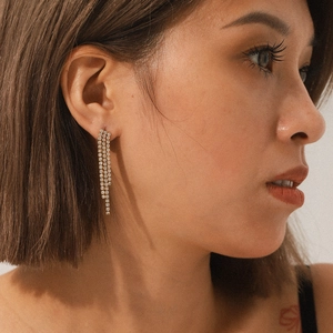 Elegant gold-plated stainless steel tassel earrings with shimmering white zircon stones