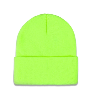 Detail view of the fluorescent green knitted beanie with a classic folded cuff design