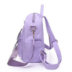 Purple faux leather large capacity backpack for women with golden zippers and straps