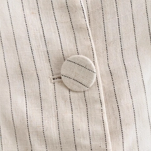 Slim fit long striped vest for women in oatmeal linen fabric with covered button detail