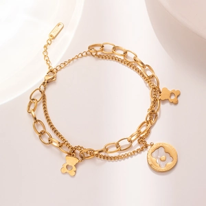 Double-layer titanium steel bracelet with 18KGP gold teddy bear and mother of pearl charm