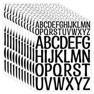 Close-up of black vinyl letter stickers in various sizes for DIY labeling and journals