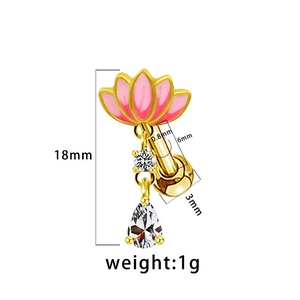 Macro detail of lotus piercing stud with pink enamel and pear-shaped white zircon