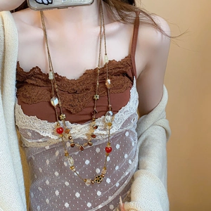 Vintage boho beaded layered necklace with crystal teardrops and gold flower charms