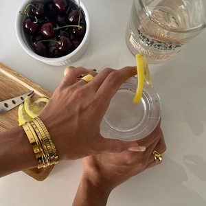 Stackable 18k gold plated stainless steel bangles and rings with zircon stones