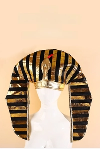 Detail showing the golden snake head and black-gold striped fabric of the Egyptian Pharaoh hat