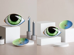Artistic evil eye ceramic decor set with green ornament and gradient tray on white blocks