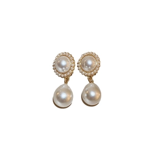 French vintage round pearl earrings with gold drop pendant for a retro elegant look