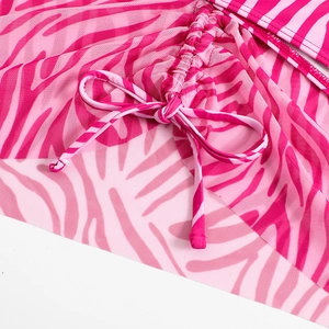Detail of pink zebra print mesh swimsuit with drawstring and neat stitching details