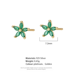 Detail showing 7.2mm 925 silver flower stud earrings with green marquise stones