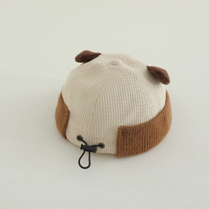 Detail of baby corduroy beanie with cute bear ears and adjustable rear drawstring strap