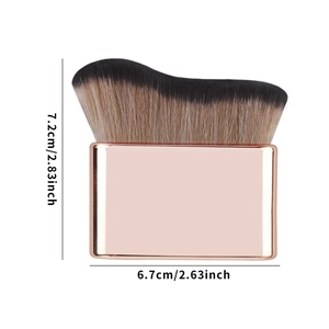 Detailed view of curved wavy foundation brush bristles with rose gold metal handle