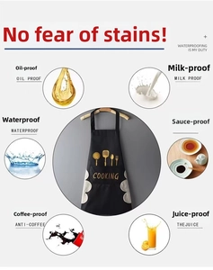 Detail of waterproof apron with side towels and golden cooking pattern graphic