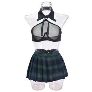 Macro shot of black mesh halter top with green plaid collar and pleated mini skirt set
