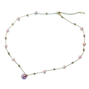 Elegant gold necklace with soft pink pearls and a large pearl pendant on white background