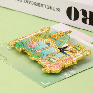 Detail shot of West Lake Hangzhou enamel magnet with Three Pools Mirroring the Moon design