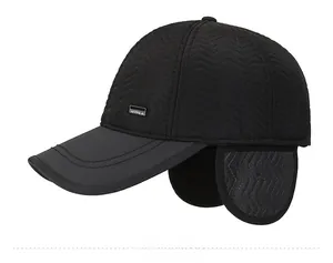 Detail of black winter baseball cap with quilted wave pattern and foldable ear flaps
