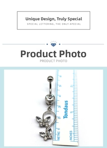 Détail du piercing de nombril papillon en argent avec pierres en zircon et pendentif de 3cm