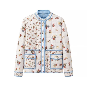 Floral quilted cotton jacket in cream with blue trim and red flower patterns