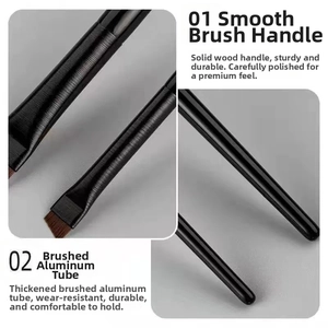 Detail of angled eyeliner brush with solid wood handle and thickened aluminum tube