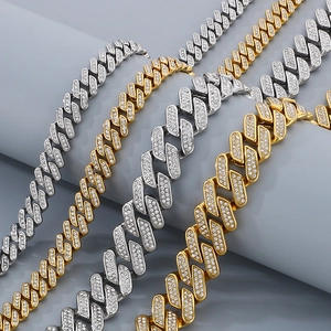 Hip hop style gold and silver iced out Cuban link chains with pavé rhinestones