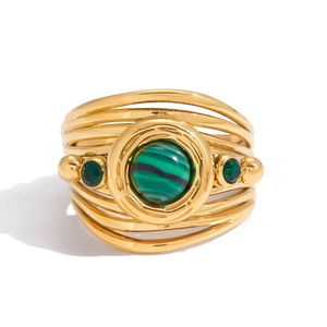 Polished gold multi-layer ring with green malachite stone and side gems on white base