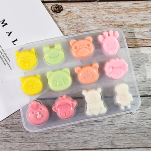 12-cavity silicone cartoon animal mold for DIY resin, chocolate and baking on wooden table