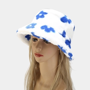 Winter plush bucket hat with blue floral pattern for women, warm faux fur sun cap