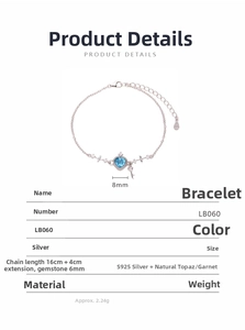 Detail view of S925 silver bracelet featuring blue topaz heart and key pendant specifications