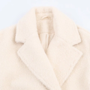 Elegant off-white textured wool coat featuring a wide notched lapel and soft plush fabric