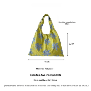 Detailed size chart for blue floral canvas tote showing dimensions and strap height