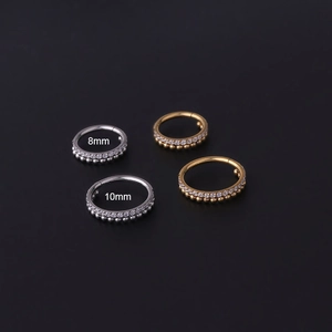 Surgical steel segment rings with pavé cubic zirconia and metal beads in 8mm and 10mm sizes