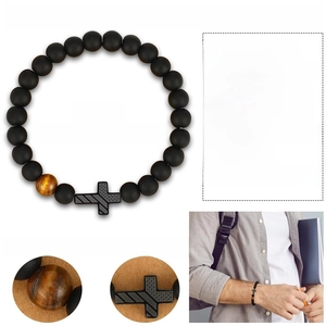 Black matte stone and tiger eye bead bracelet featuring a US flag metal cross charm