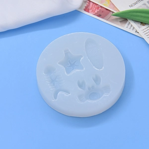 Blue silicone mold for DIY baking featuring sea crab starfish and fish patterns