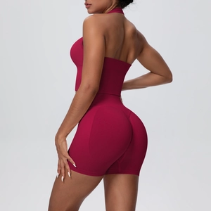 Rear view of dark red seamless halter crop top and high waist booty lifting gym shorts