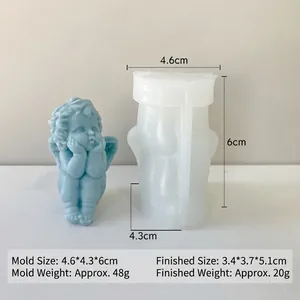 Detail view of little angel silicone candle mold and the blue finished cupid statue
