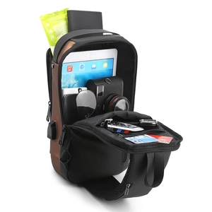 Detail showing the large interior storage capacity of a water-resistant USB chest bag