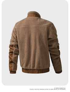 Detail view of the brown sherpa jacket back with tonal fabric panels and high-neck design