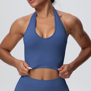 Close-up of seamless dark blue ribbed knit fabric on halter neck high-impact sports bra
