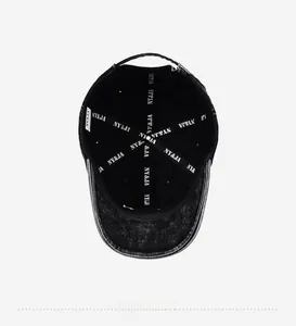Detail view of the interior reinforced webbing and adjustable buckle of the washed cap