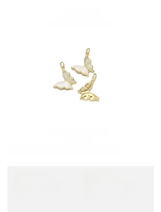 Detail of 18K gold plated butterfly pendant with pink opal and cubic zirconia, 17x19mm size