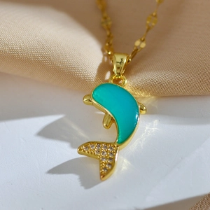 Luxurious gold-plated titanium dolphin pendant necklace with green enamel and zircons