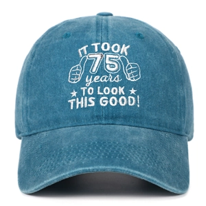 Macro detail of 75th birthday embroidery on vintage washed cotton baseball cap