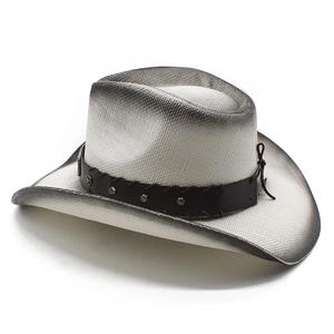Close-up of woven straw cowboy hat featuring vintage gradient edges and metal studded band