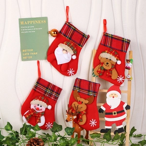 Set of four Christmas stockings with Santa, bear, snowman and reindeer embroidery