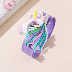 Children's cartoon unicorn slap watch with purple silicone strap on a warm pink table