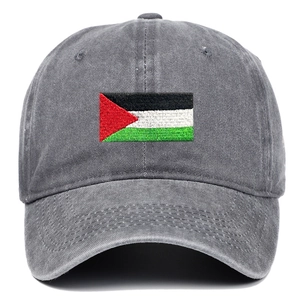 Detailed close-up of high-quality embroidery and washed cotton fabric on the grey baseball cap