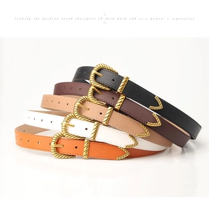Detailed view of five vintage women's leather belts with golden buckles in varied colors