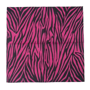 Detail view of the pink and black zebra stripe pattern on a square bandana fabric