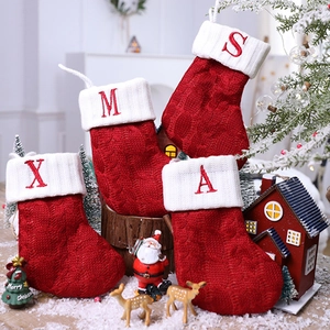 Classic red and white knitted Christmas stockings with XMAS letter embroidery set of 4